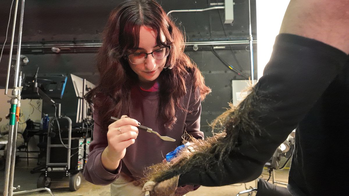Creature prosthetic groomed between takes