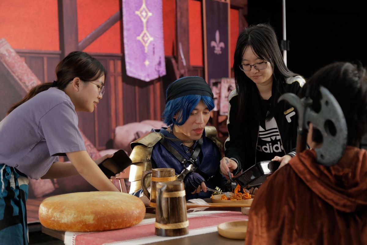 Adjusting costume on the tavern set