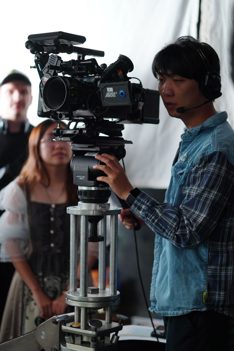 Camera team on a bright location