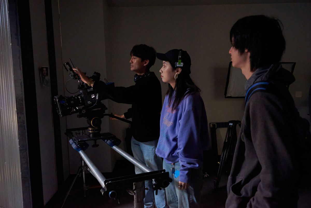 Camera and crew in a tight interior